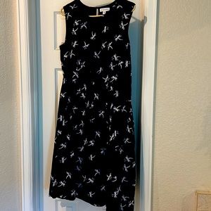 Emilyandfin sleeveless dress. Navy blue with cute firefly design. Has pockets!